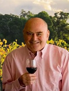 James Halliday with glass of red wine in hand.